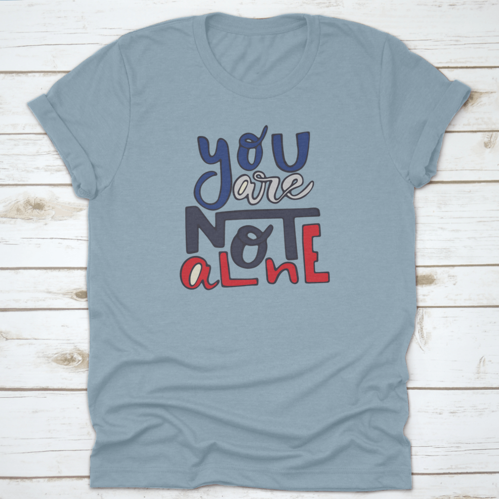 A soft cotton shirt featuring the inspirational quote 'You Are Not Alone' in a stylish design, perfect for casual wear.