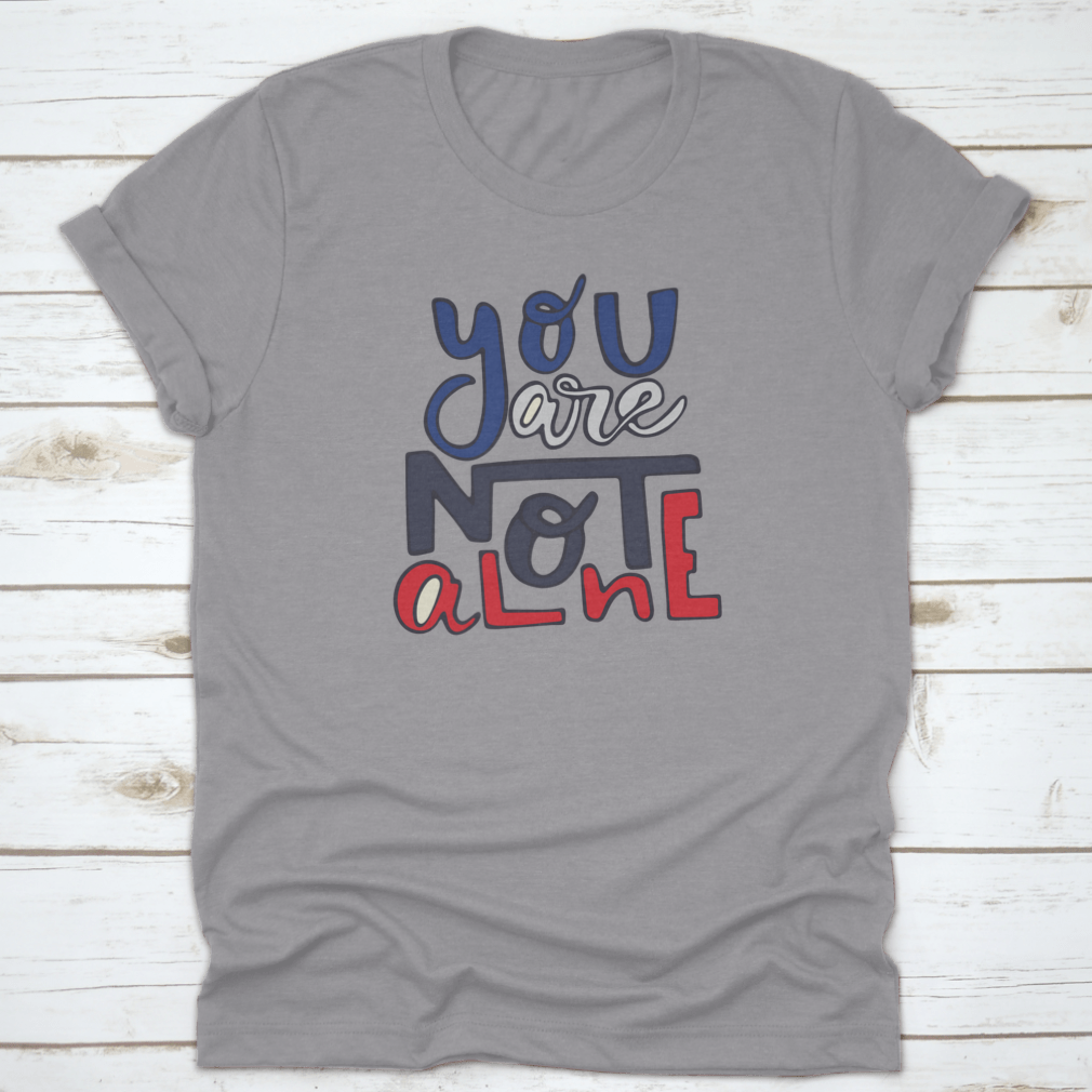 A soft cotton shirt featuring the inspirational quote 'You Are Not Alone' in a stylish design, perfect for casual wear.