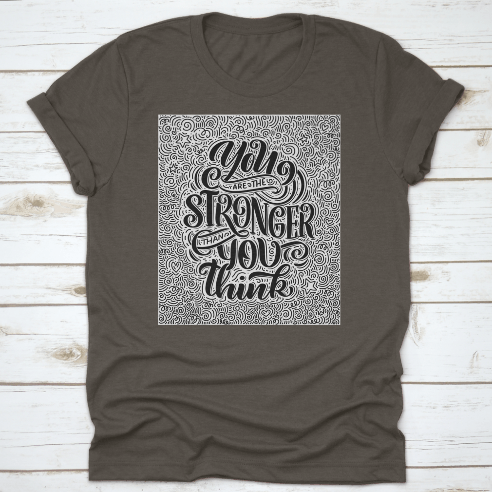 A motivational T-shirt featuring the quote 'You Are Stronger Than You Think', made from soft cotton fabric.