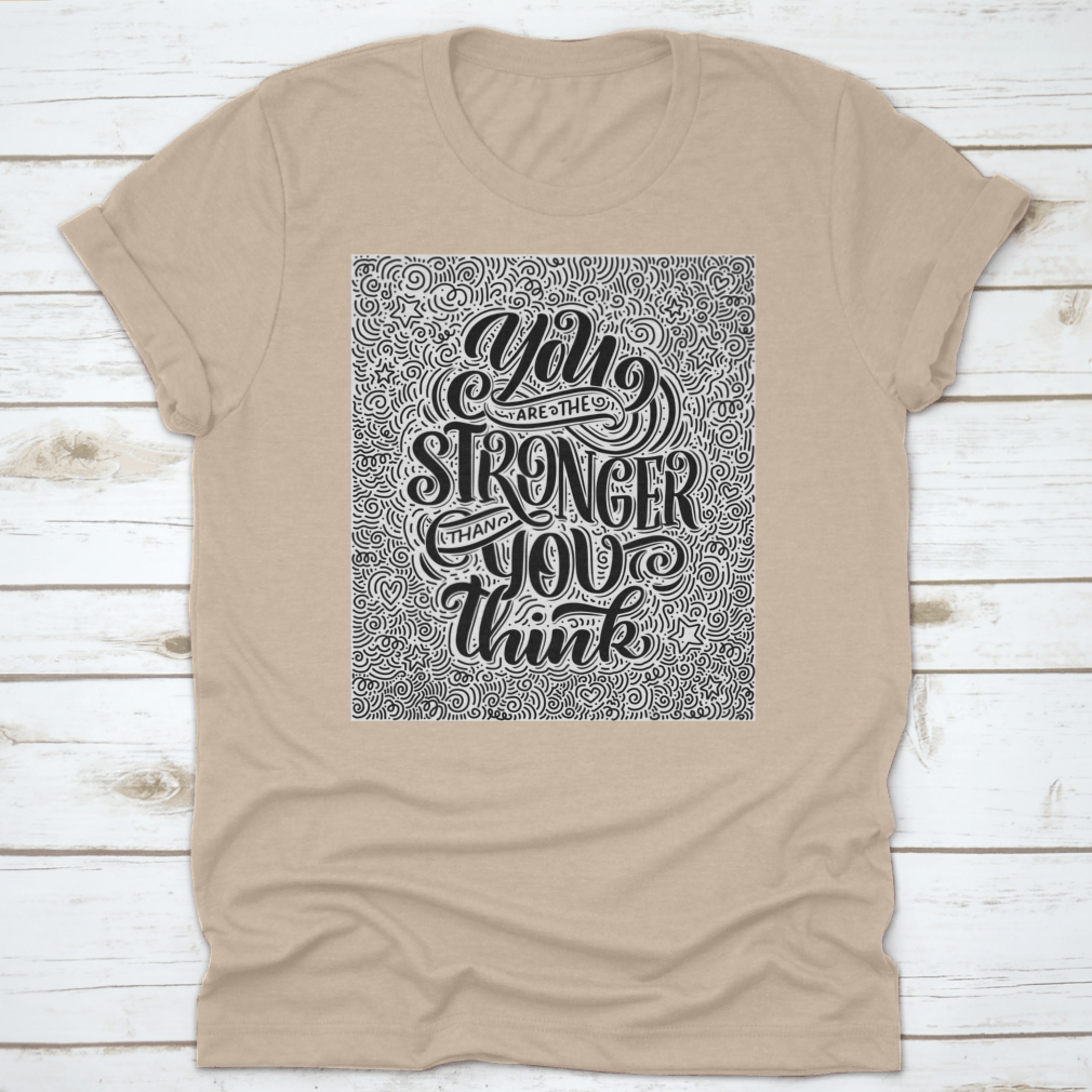 A motivational T-shirt featuring the quote 'You Are Stronger Than You Think', made from soft cotton fabric.