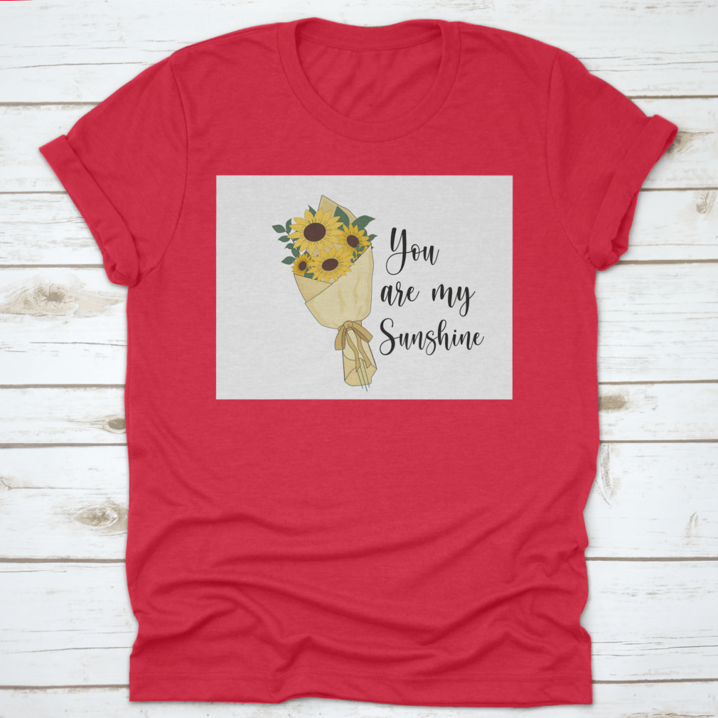 You Are Sunshine T-shirt featuring a vibrant sunflower watercolor design, made from soft cotton fabric.