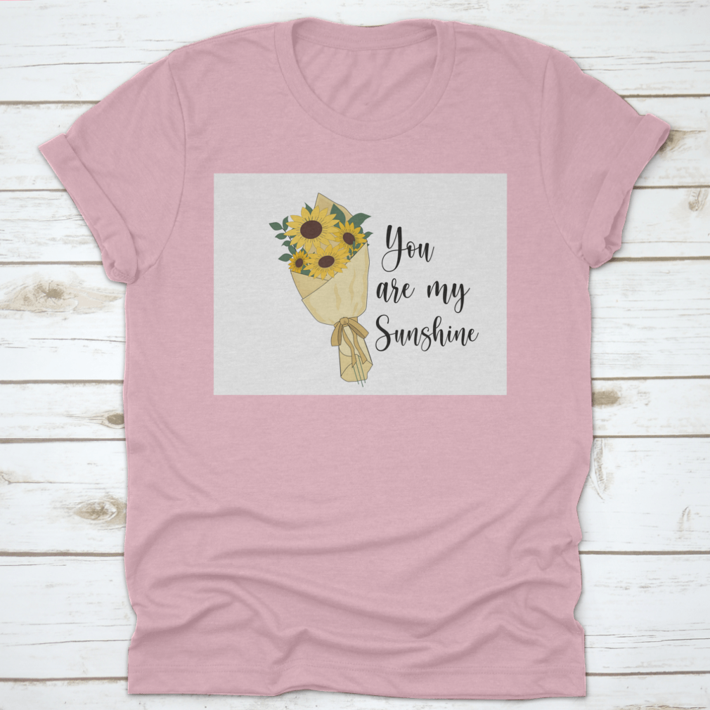 You Are Sunshine T-shirt featuring a vibrant sunflower watercolor design, made from soft cotton fabric.