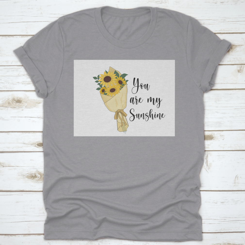 You Are Sunshine T-shirt featuring a vibrant sunflower watercolor design, made from soft cotton fabric.