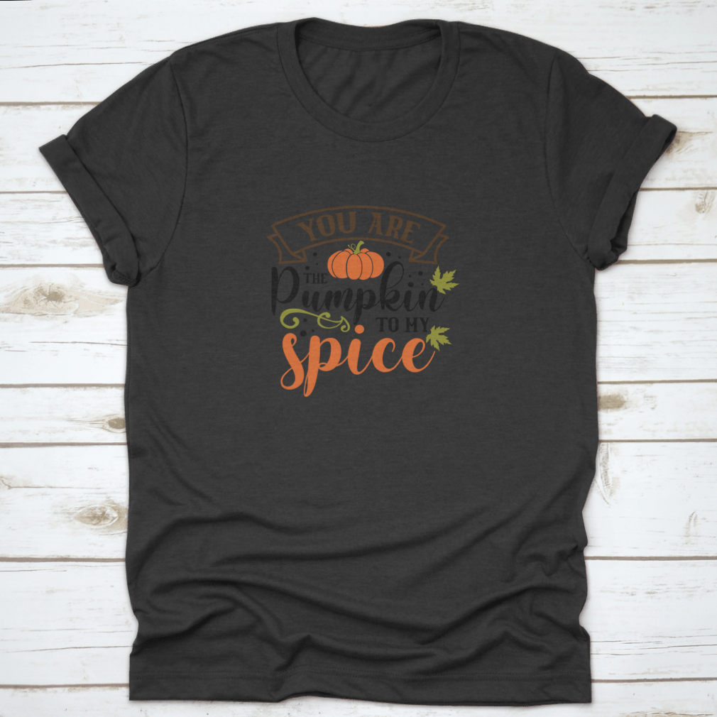 A cozy T-shirt featuring the quote 'You Are The Pumpkin To My Spice' in a stylish font, perfect for autumn wear.