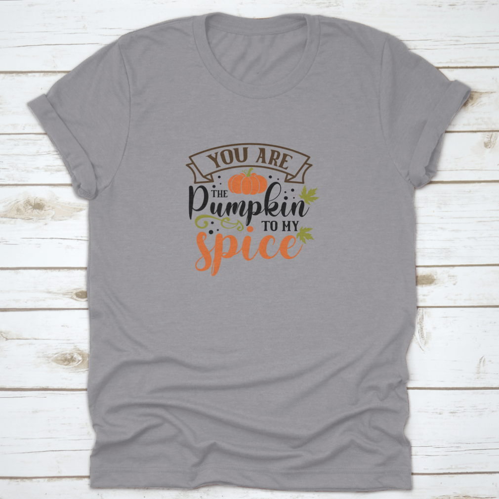 A cozy T-shirt featuring the quote 'You Are The Pumpkin To My Spice' in a stylish font, perfect for autumn wear.