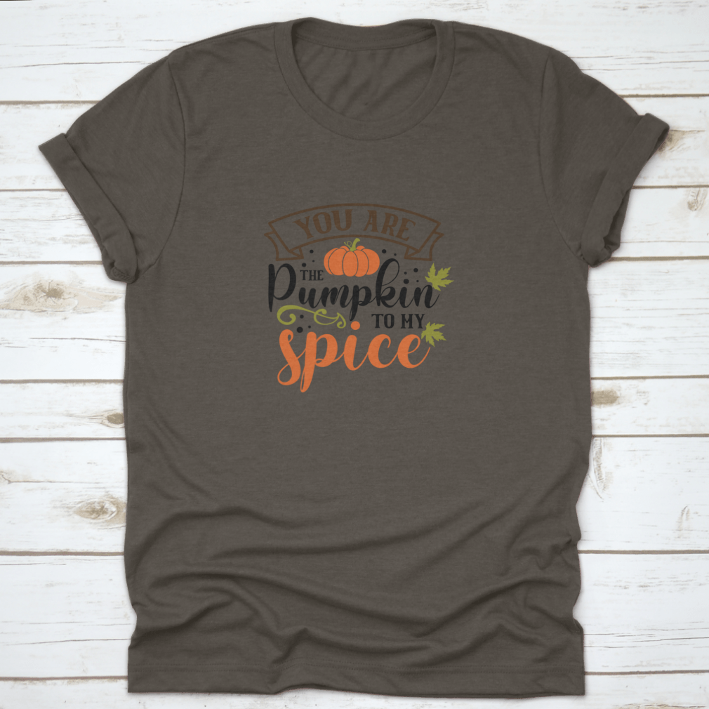A cozy T-shirt featuring the quote 'You Are The Pumpkin To My Spice' in a stylish font, perfect for autumn wear.