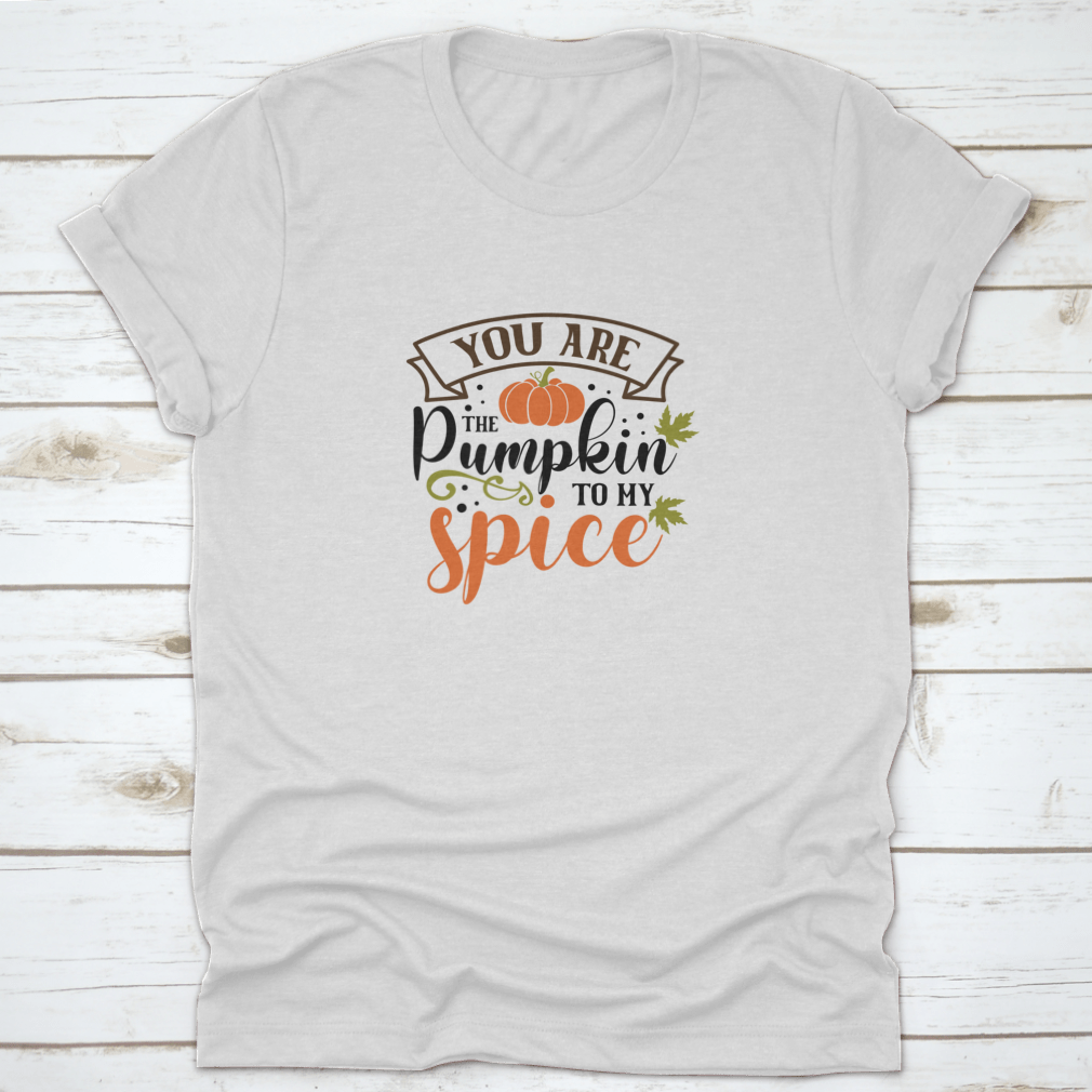 A cozy T-shirt featuring the quote 'You Are The Pumpkin To My Spice' in a stylish font, perfect for autumn wear.