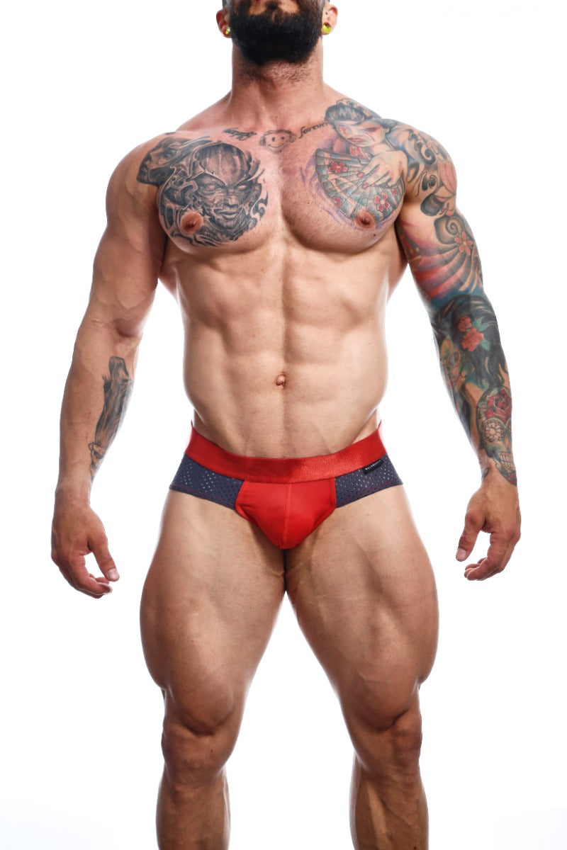 MaleBasics Spot Brief in Red featuring a low-rise cut, cotton front, and mesh detailing for a stylish and comfortable fit.