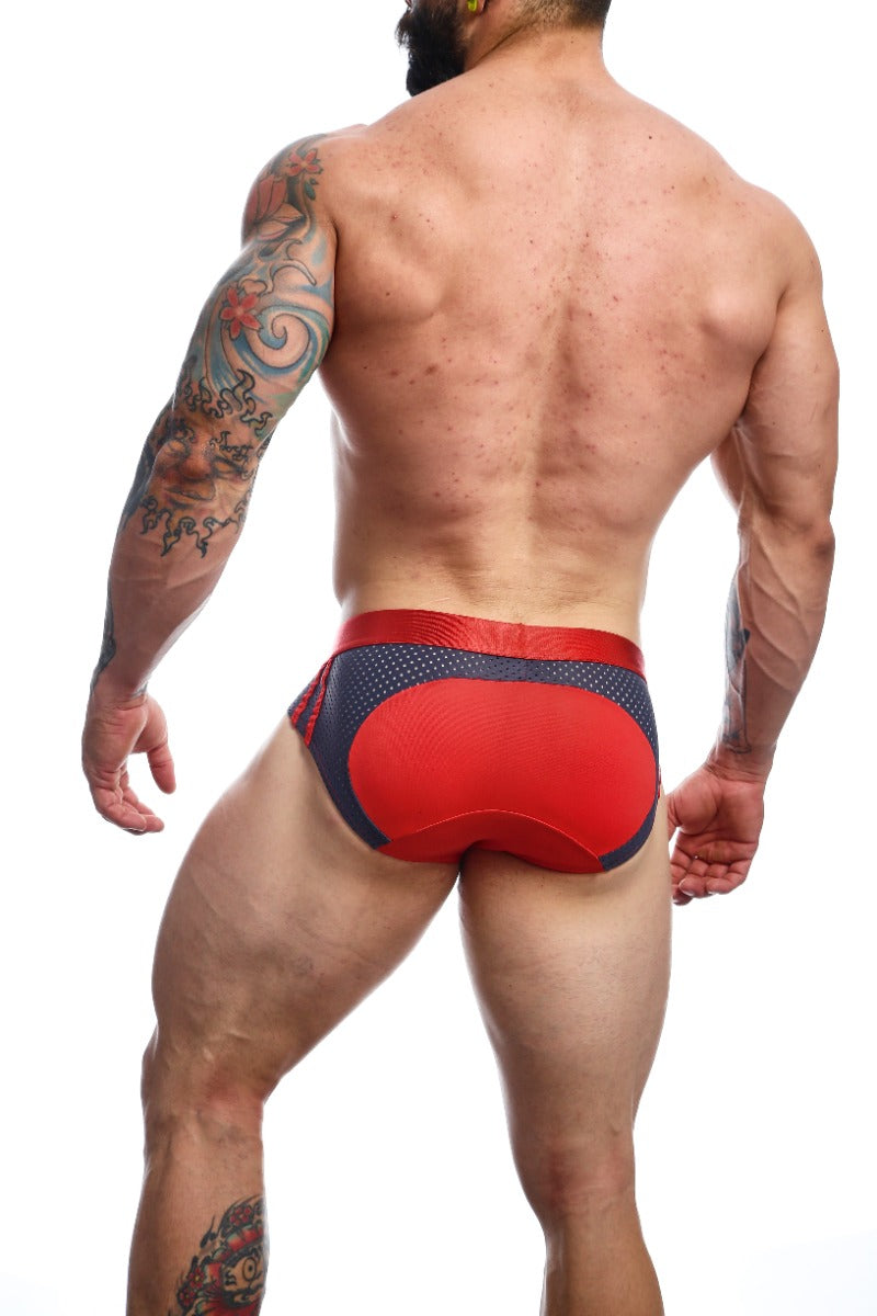 MaleBasics Spot Brief in Red featuring a low-rise cut, cotton front, and mesh detailing for a stylish and comfortable fit.