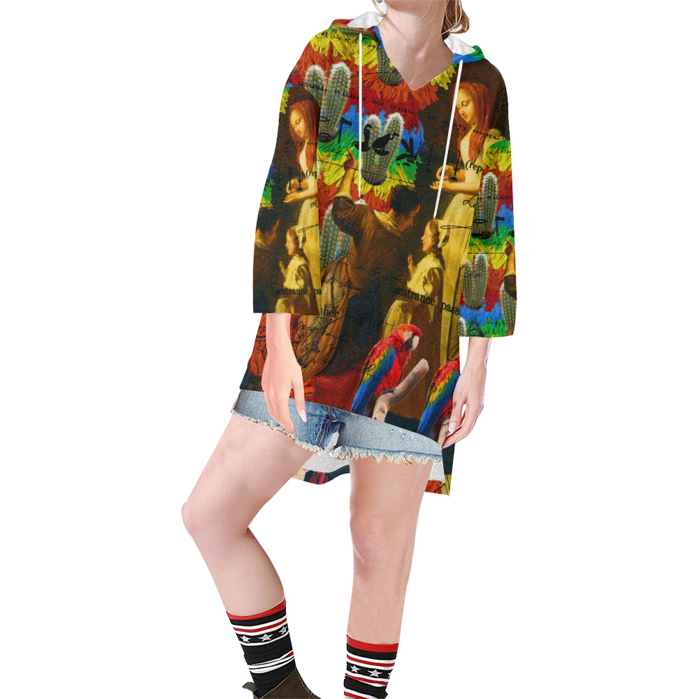 A vibrant unisex tunic hoodie featuring a drawstring hood, v-neckline, and oversized silhouette with colorful collage prints.