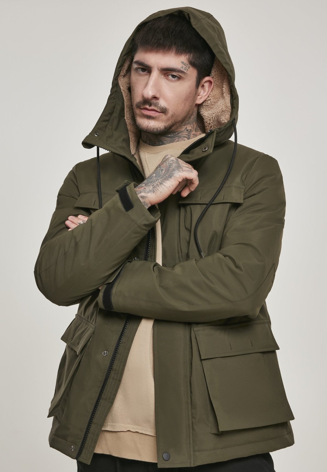 Authentic Hooded Field Jacket in Dark Olive featuring a Sherpa collar and multiple pockets, perfect for autumn and winter wear.