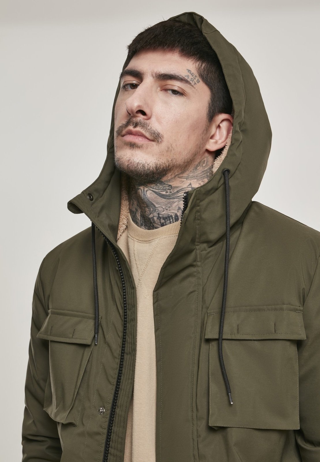 Authentic Hooded Field Jacket in Dark Olive featuring a Sherpa collar and multiple pockets, perfect for autumn and winter wear.