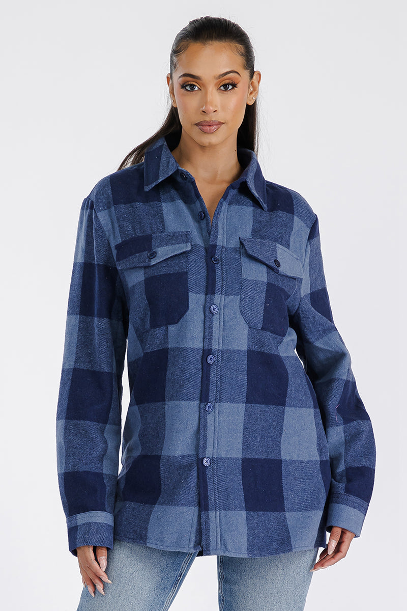 A stylish oversized flannel shacket in soft brushed fabric, featuring button closure and chest pockets, perfect for casual layering.