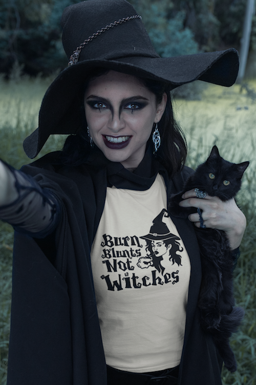 A stylish unisex t-shirt featuring the bold graphic 'Burn Blunts Not Witches', made from soft ring-spun cotton, perfect for casual wear.