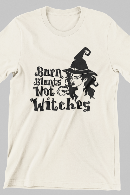 A stylish unisex t-shirt featuring the bold graphic 'Burn Blunts Not Witches', made from soft ring-spun cotton, perfect for casual wear.
