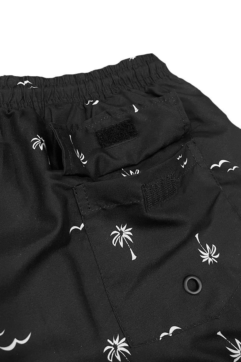 B/W Palm Print Swim Shorts featuring a stylish palm design, regular fit, and mesh lining, perfect for beach and pool activities.
