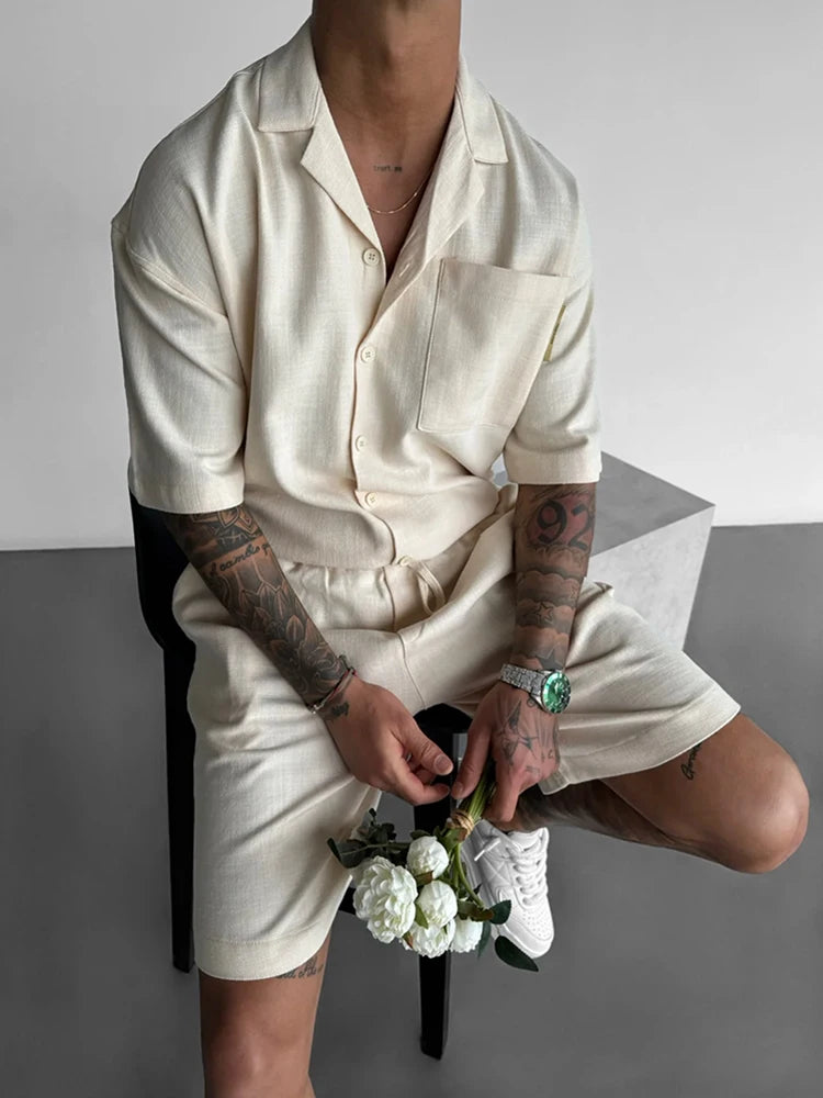 Men's beach vacation shorts set in solid color, featuring drawstring closure and short sleeves, perfect for summer outings.