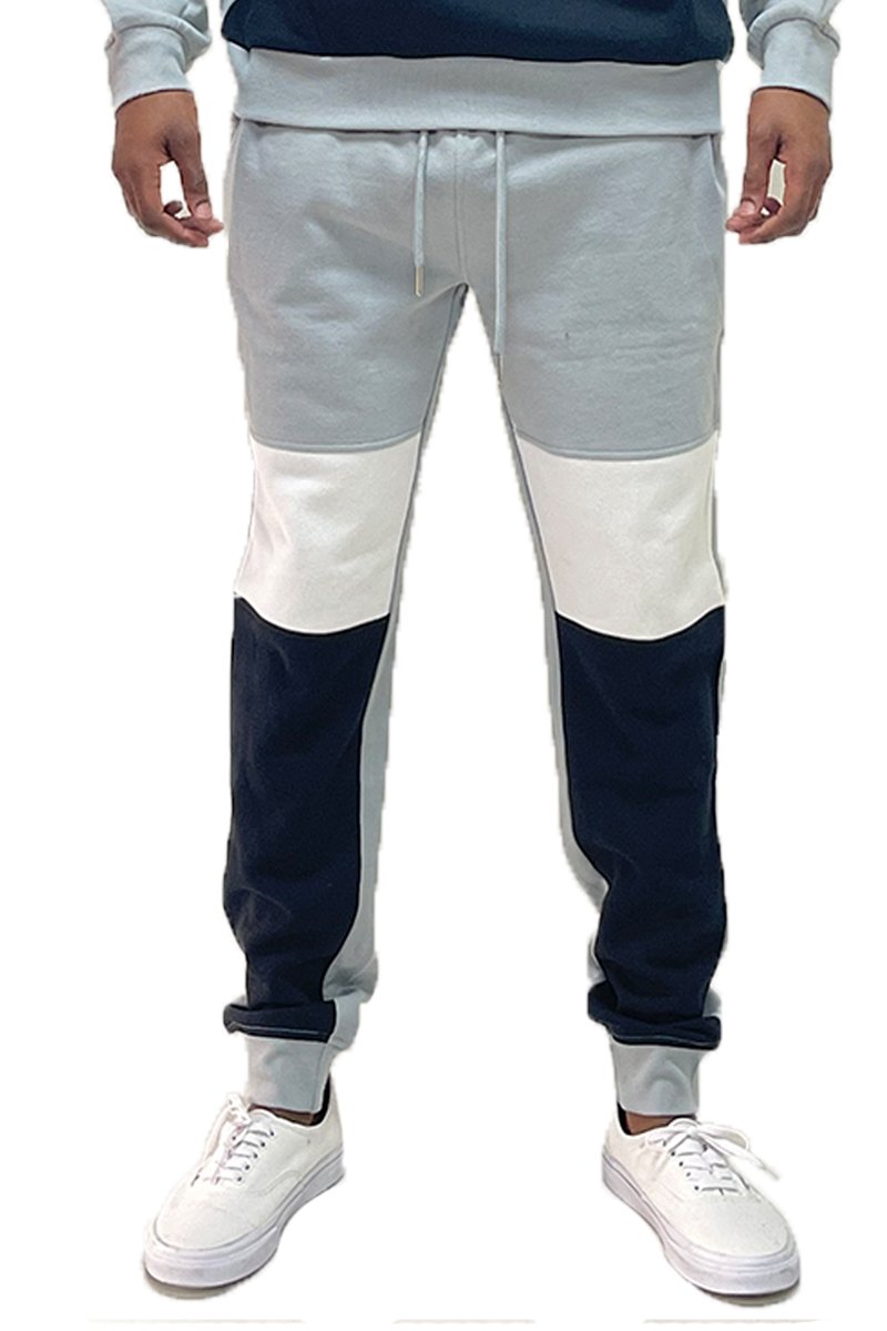 Color Block Sweats featuring an elastic waist, drawstring, and ribbed ankle cuffs in a stylish design.