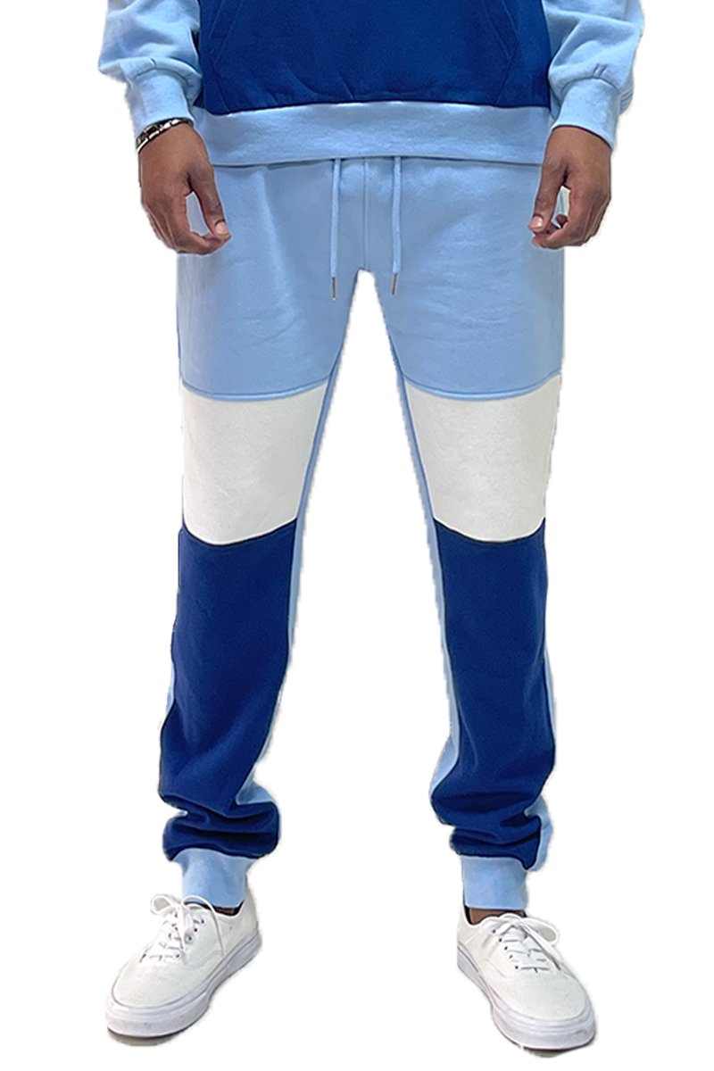 Color Block Sweats featuring an elastic waist, drawstring, and ribbed ankle cuffs in a stylish design.