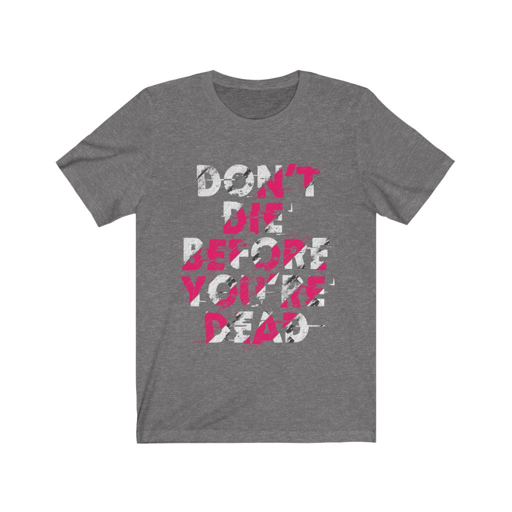 A unisex T-shirt featuring the motivational quote 'Don't Die Before You're Dead' printed in bold vinyl on soft cotton fabric.