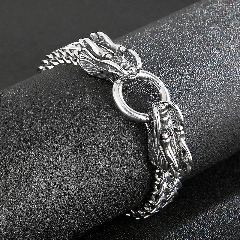 A stylish Double Dragon Chain Bracelet featuring gold plated links and a bold hip hop design, available in black and silver colors.