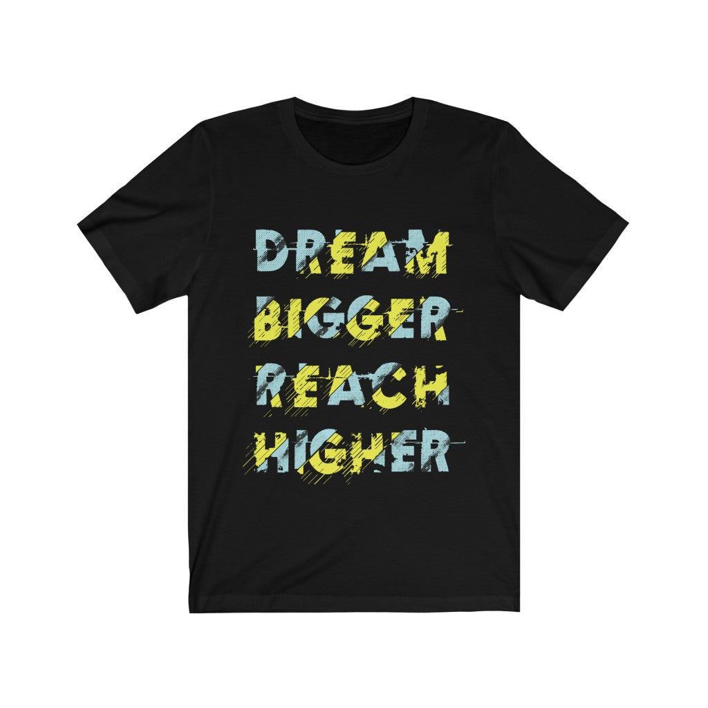 A unisex t-shirt featuring the inspirational quote 'Dream Bigger Reach Higher' printed in stylish typography on a soft cotton fabric.