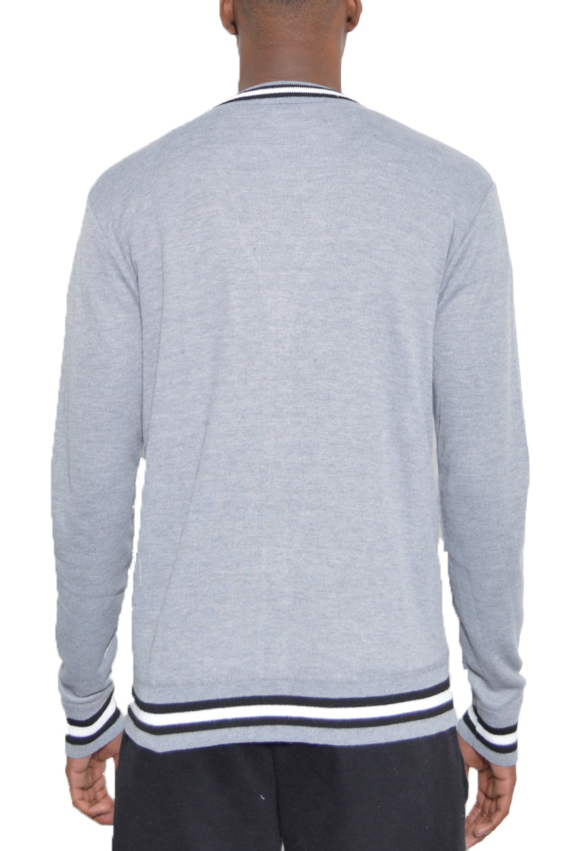 Drew Cardigan made of 100% polyester, showcasing a modern fit and refined design, perfect for layering.