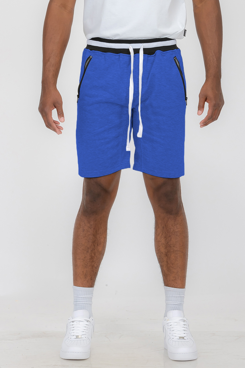 A pair of French Terry Sweat Shorts featuring an elastic waistband and standard pockets, made from a soft polyester and spandex blend.