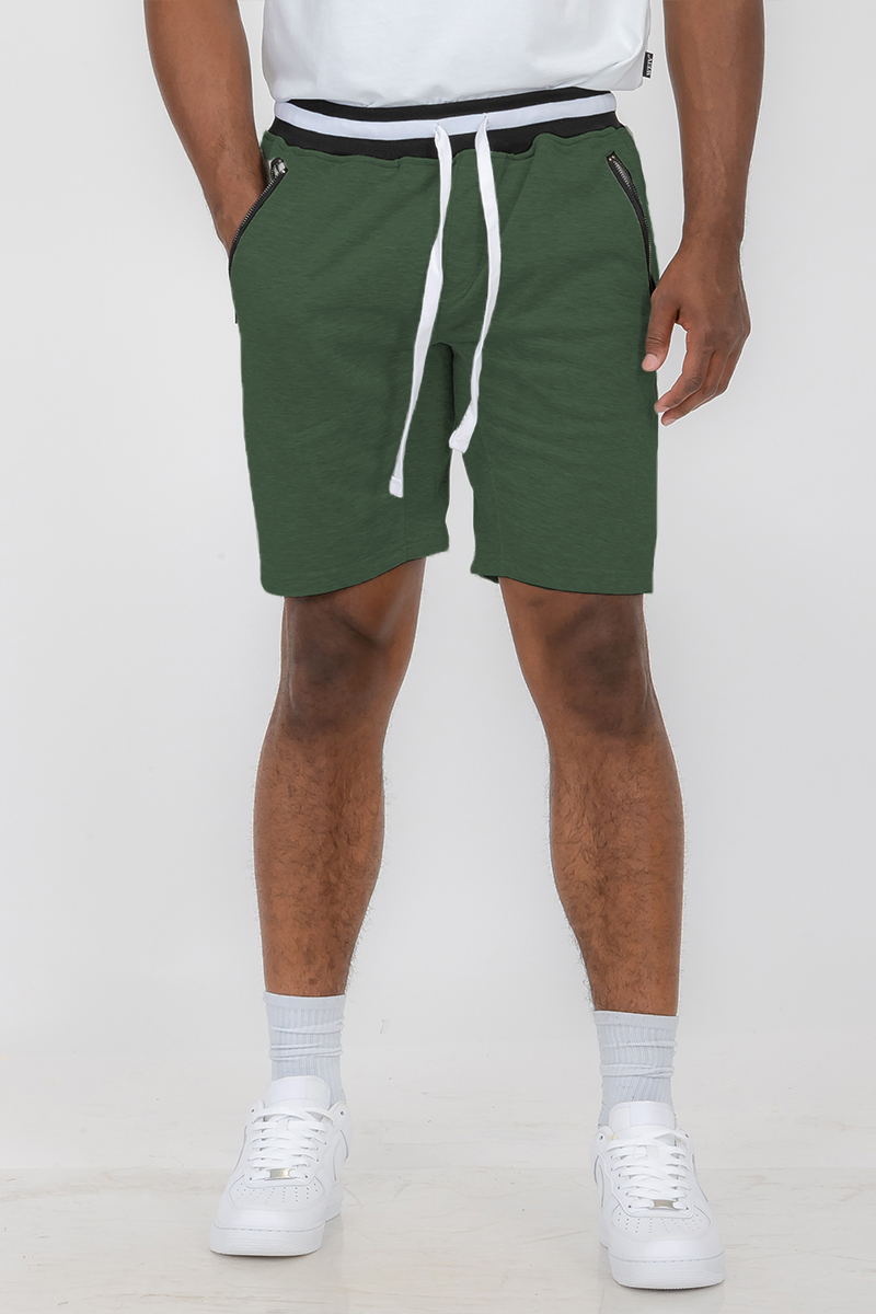 A pair of stylish French Terry Sweat Shorts in a soft fabric, featuring an elastic waistband with a drawstring and standard pockets.