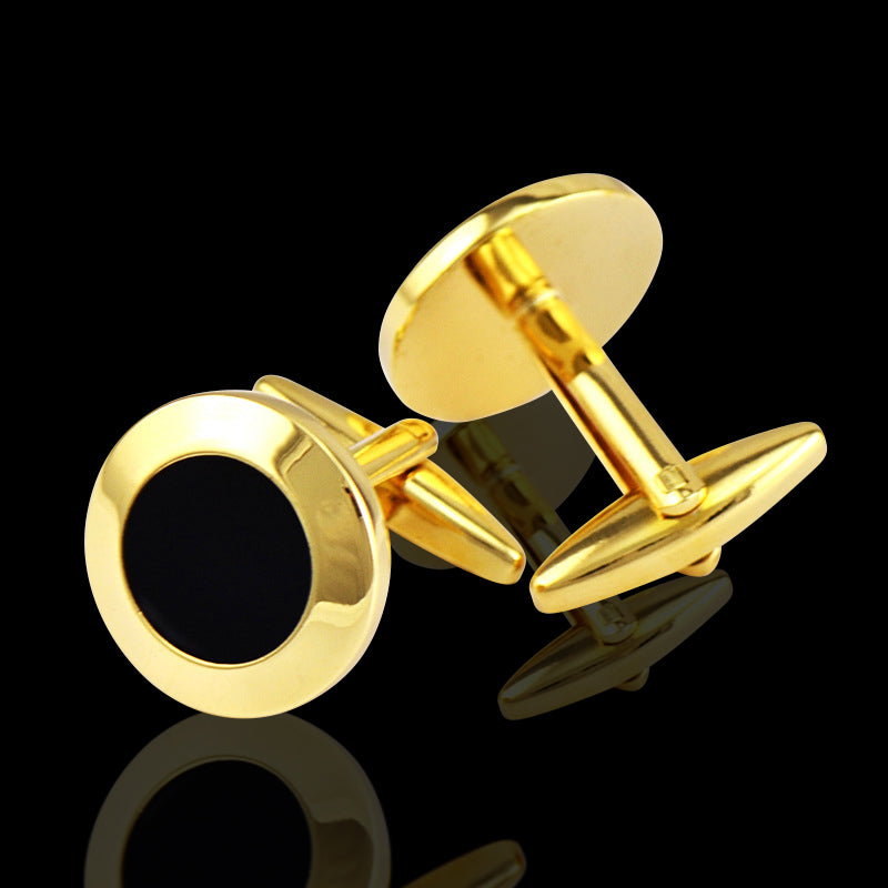Gold black stainless steel circles cufflinks in an elegant gift box, showcasing their luxurious design and craftsmanship.