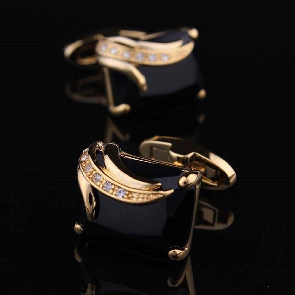 Gold and black mens stainless steel square cufflinks elegantly displayed in a gift box, showcasing their luxurious design.