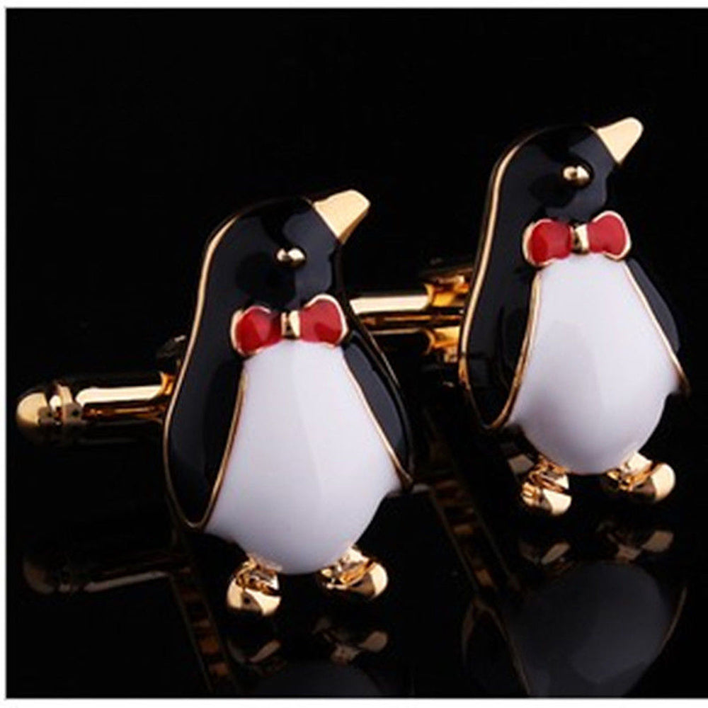 Gold Mens Stainless Steel Penguins Cufflinks with dark blue stone triangle, elegantly displayed in a gift box.