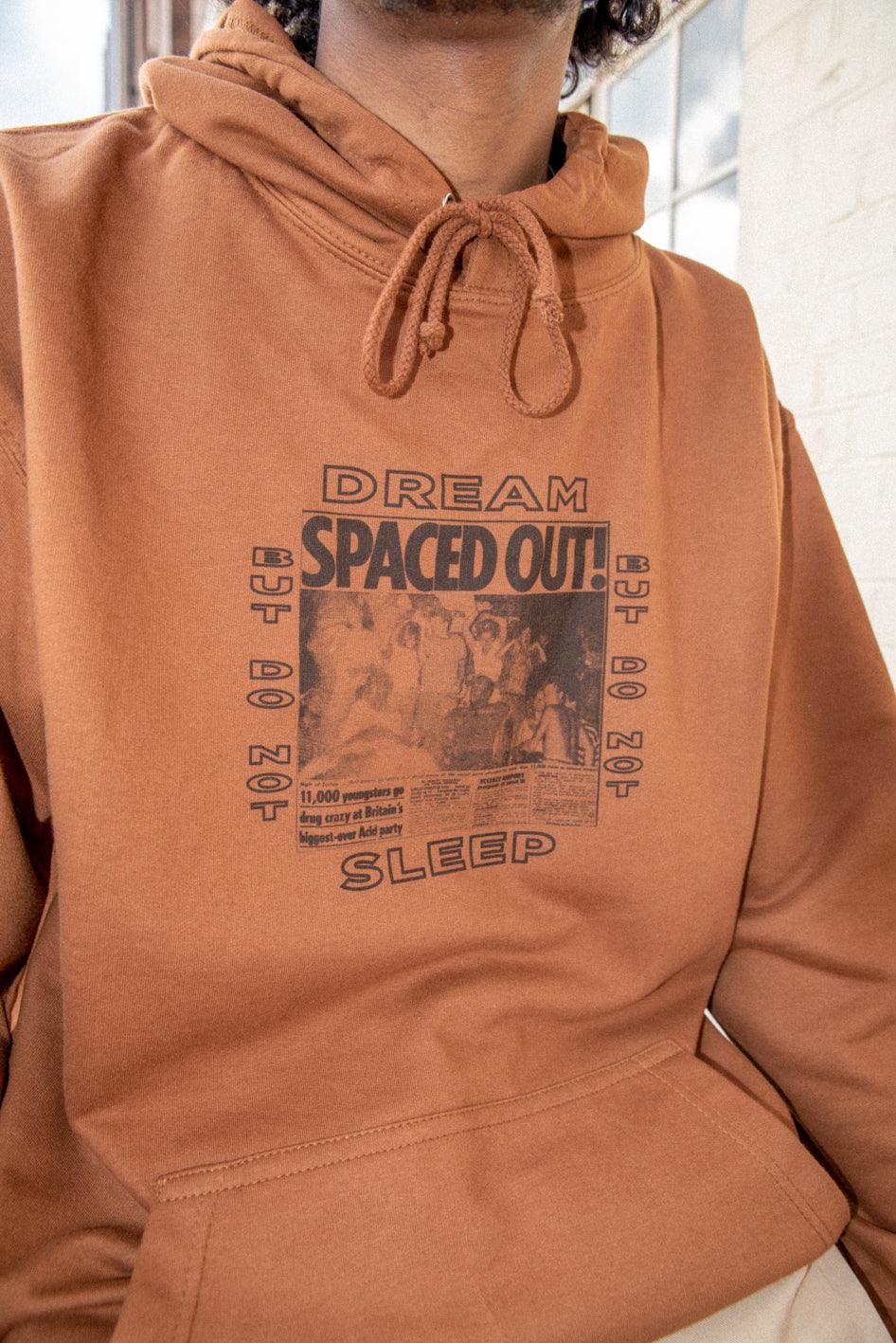 Caramel Toffee Hoodie featuring Spaced Out! print, showcasing its vibrant design and heavyweight cotton material.