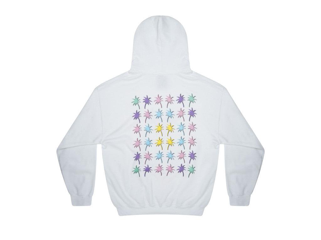 White hoodie featuring a vibrant tropical palm tree print on front and back, showcasing a relaxed fit and woven label details.