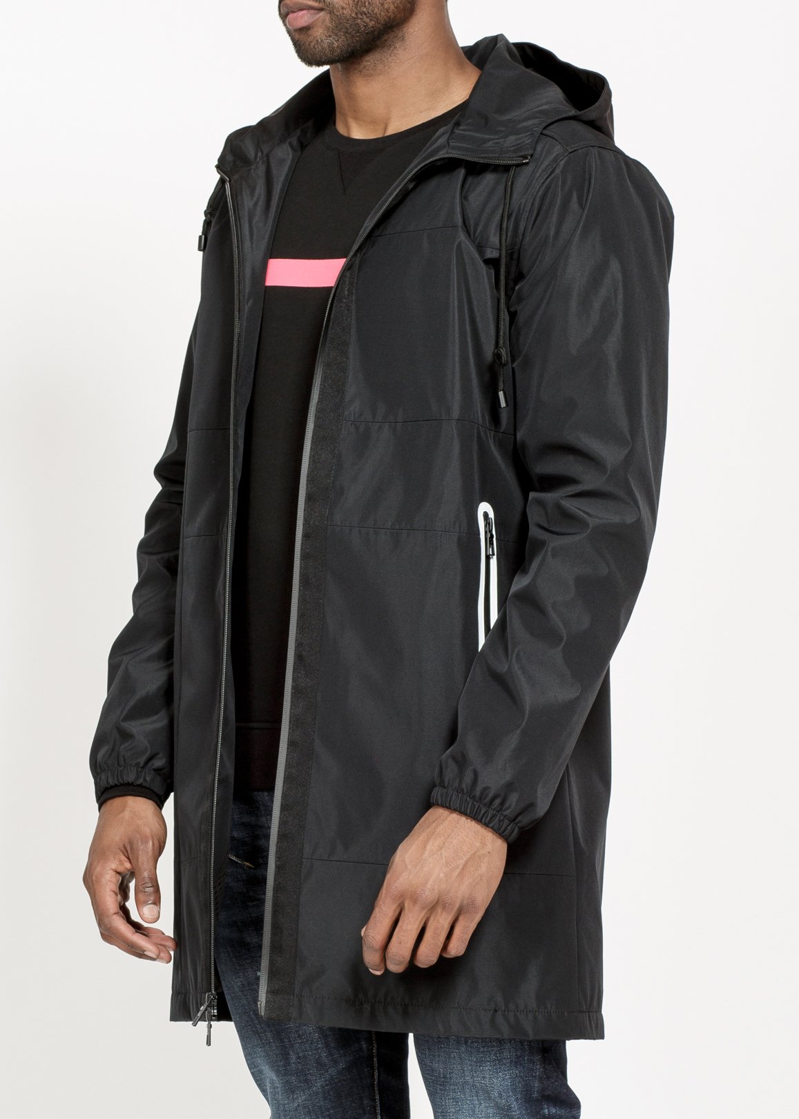 Konus Men's Water Repellent Jacket in Black featuring a mock neck, multi patch work, and zipper pockets.