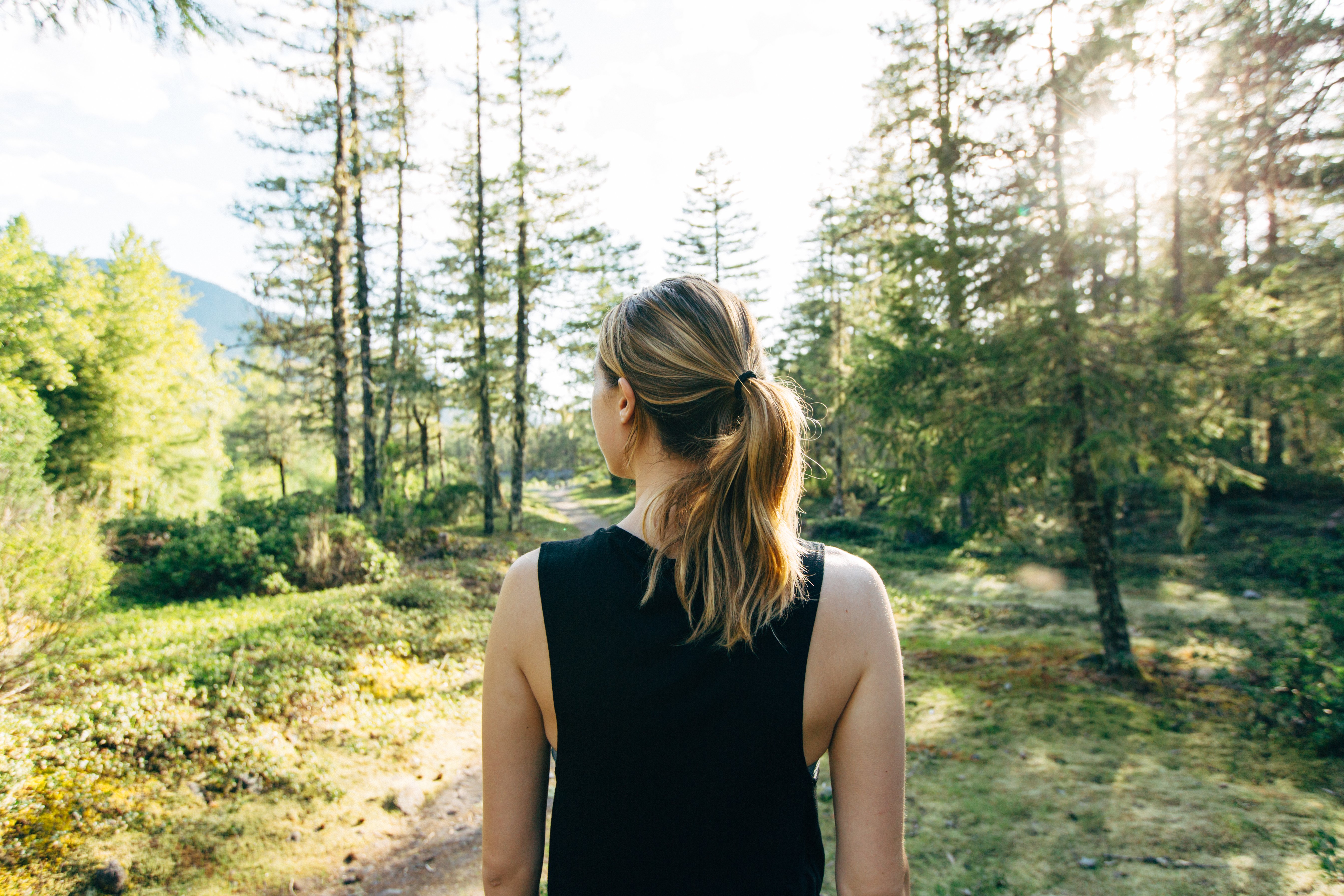 Ladies Mountain Range Muscle Tank in black featuring a mountain range design, made from soft ringspun cotton.