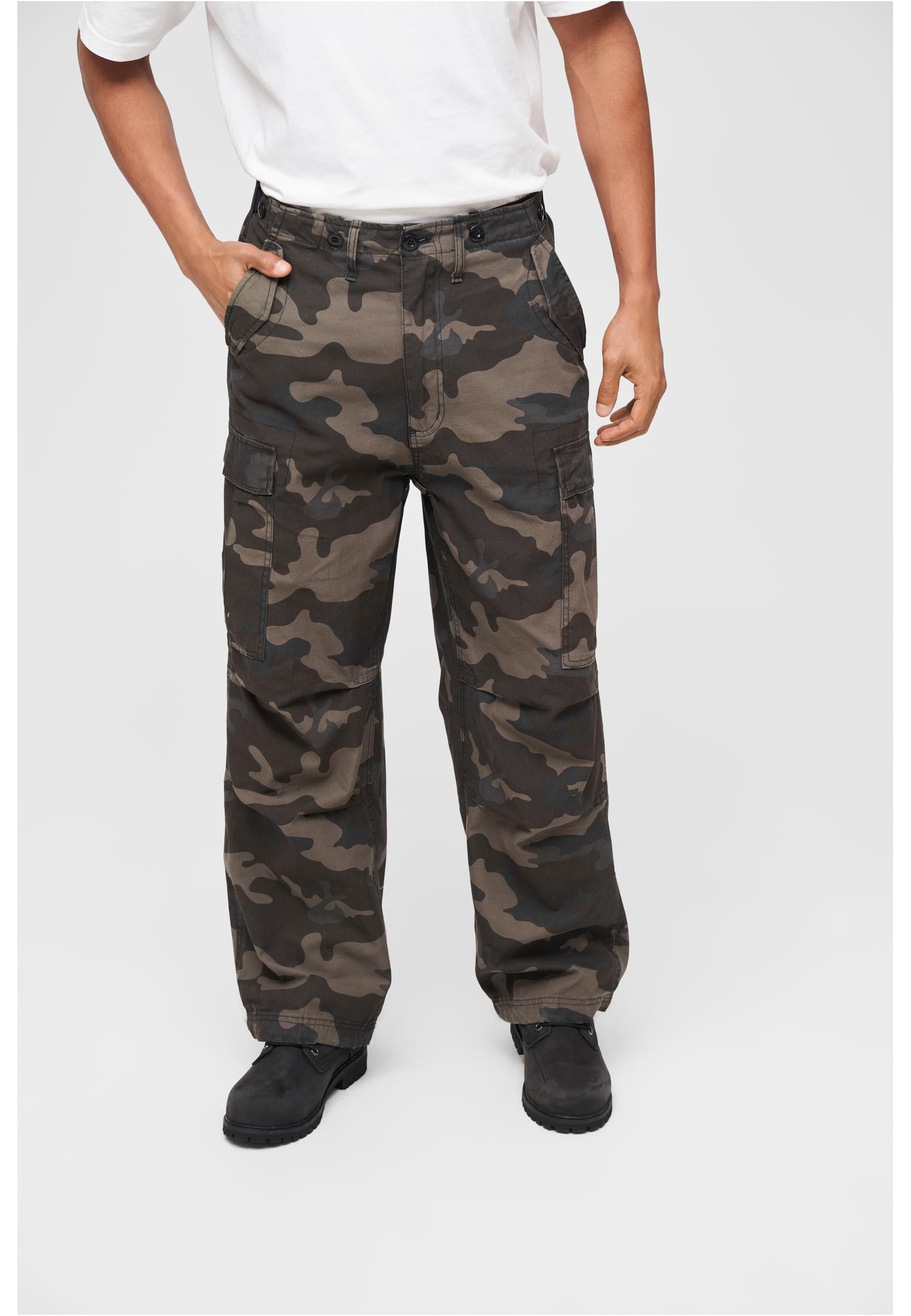 M65 Vintage Cargo Pants in a stylish urban setting, showcasing their comfortable fit and adjustable drawstrings.