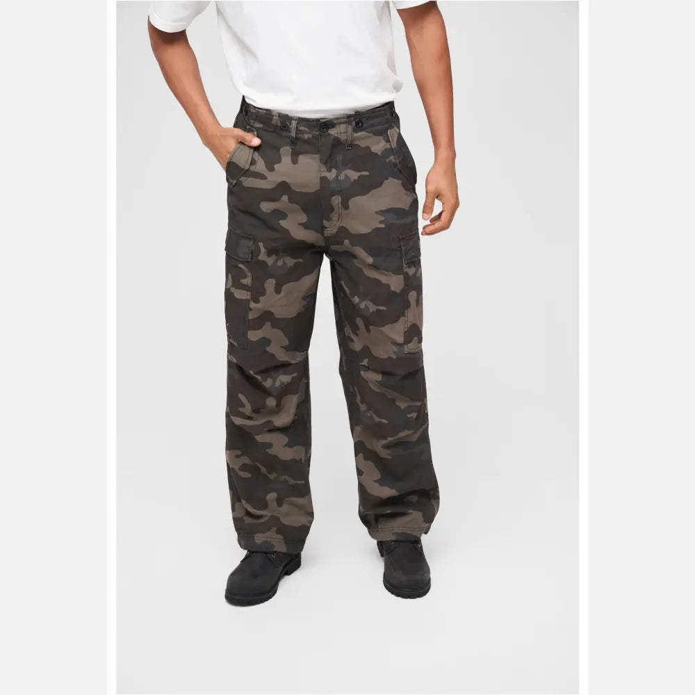 M65 Vintage Cargo Pants in a stylish urban setting, showcasing their comfortable fit and adjustable drawstrings.