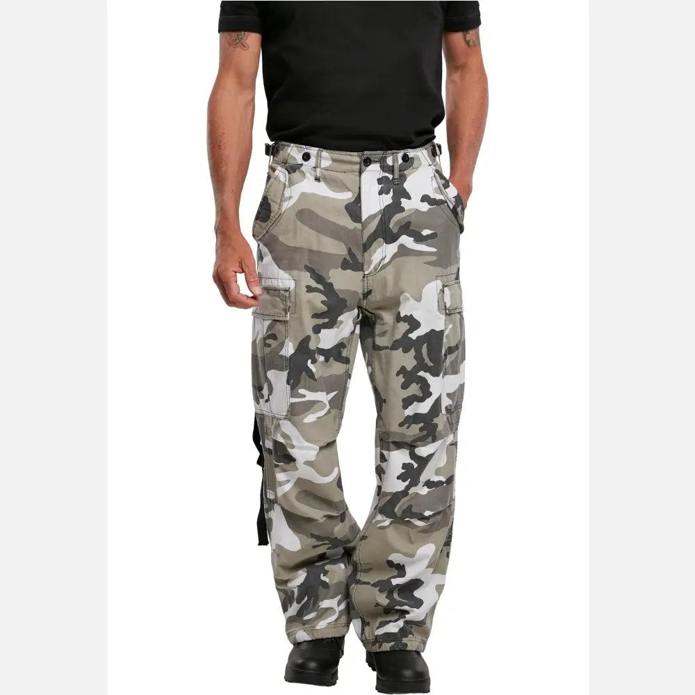 M65 Vintage Cargo Pants in a stylish urban setting, showcasing their comfortable fit and adjustable drawstrings.
