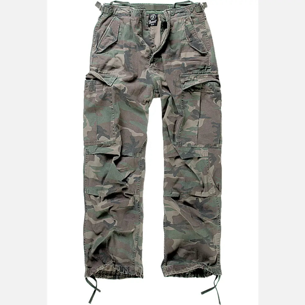 M65 Vintage Cargo Pants in a stylish urban setting, showcasing their comfortable fit and adjustable drawstrings.
