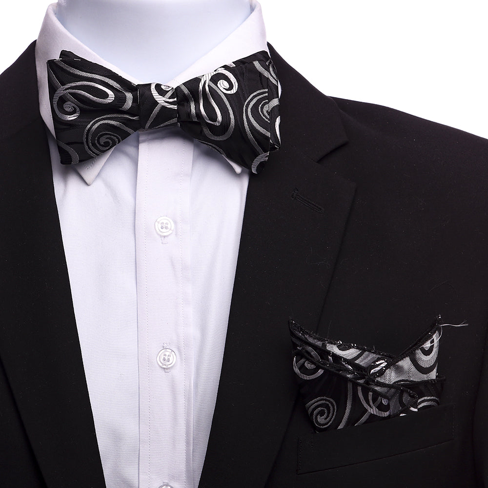 Men's black and silver gray swirls self bow tie with matching handkerchief, elegantly displayed in a gift box.