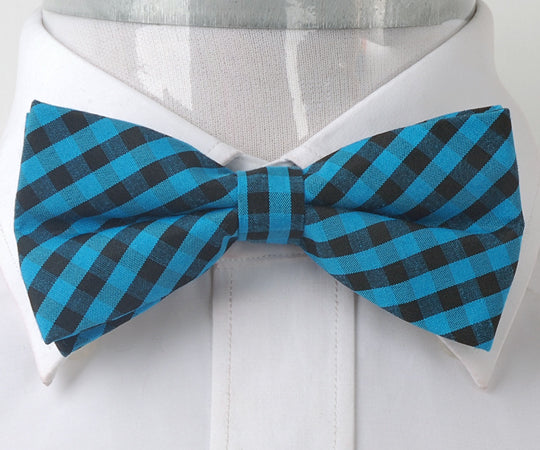 Men's Blue Black Silk Pre-Tied Bow Tie displayed elegantly, showcasing its luxurious fabric and classic design.