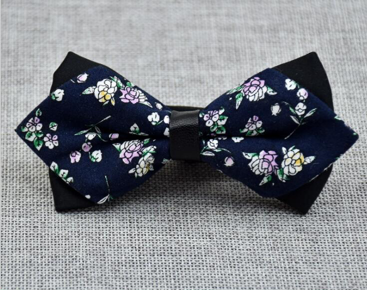 Men's blue and white floral pre-tied bow tie made from 100% soft cotton, showcasing elegant design and adjustable neck size.