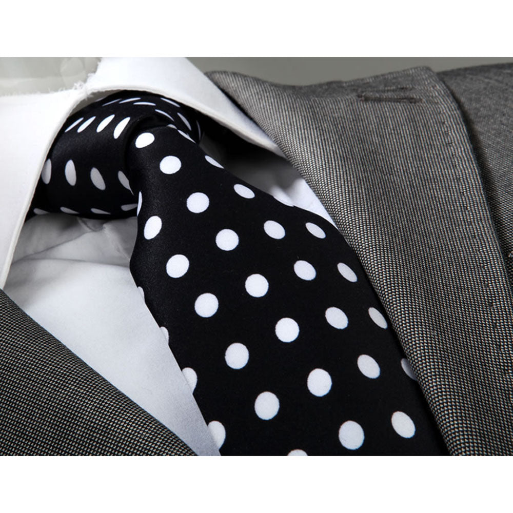 Men's black and white polka dot silk necktie elegantly displayed in a gift box, showcasing its luxurious fabric and stylish design.