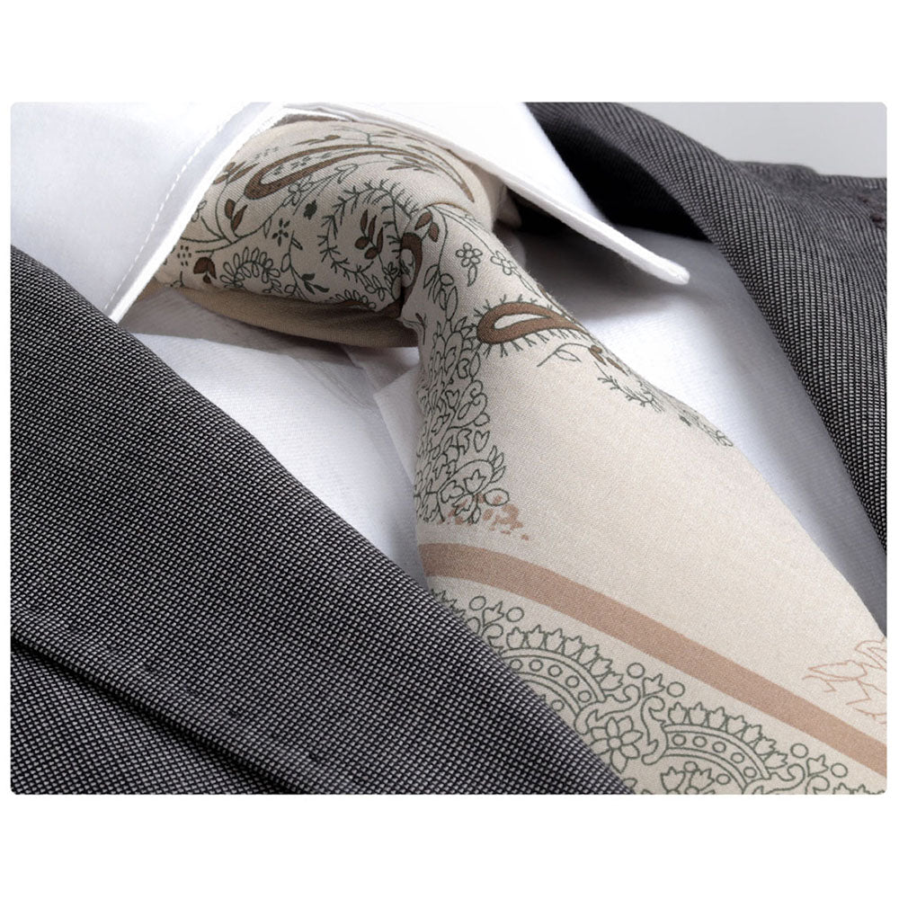Men's Jacquard Cream Paisley Premium Neck Tie displayed in an elegant gift box, showcasing its luxurious silk fabric and intricate design.