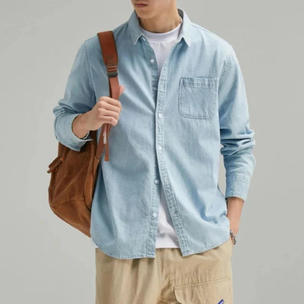 Men's Long Sleeve Denim Shirt in light blue with a chest pocket, showcasing a classic button-down design.