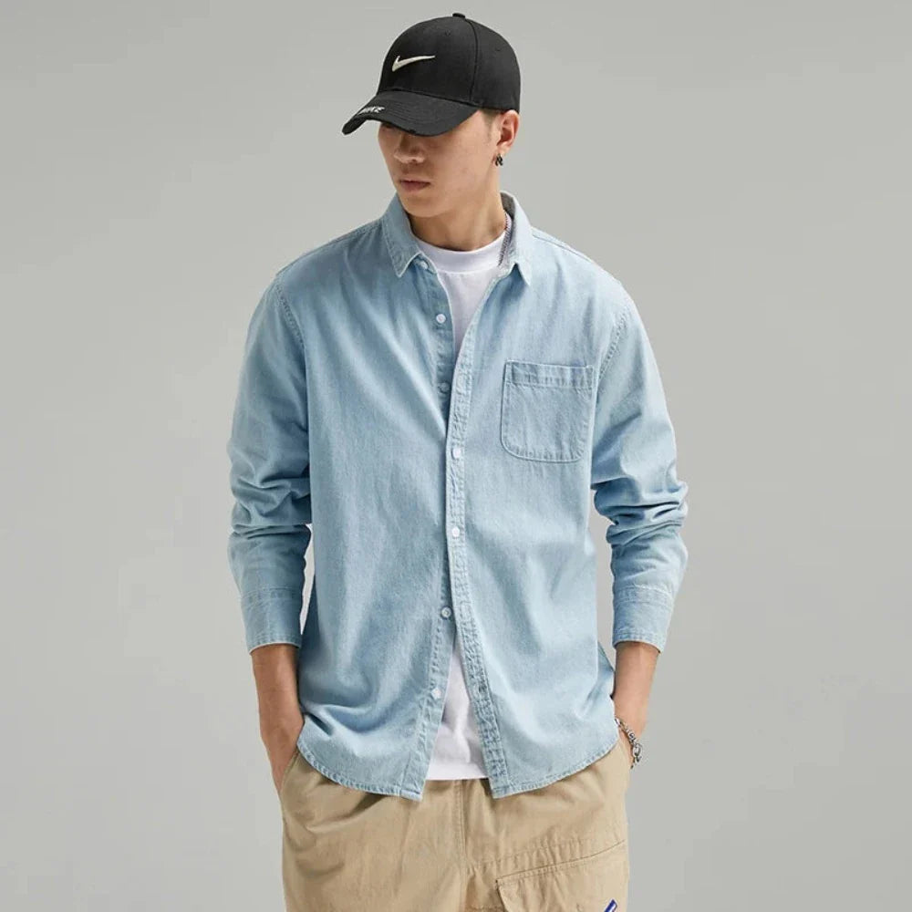 Men's Long Sleeve Denim Shirt in light blue with a chest pocket, showcasing a classic button-down design.