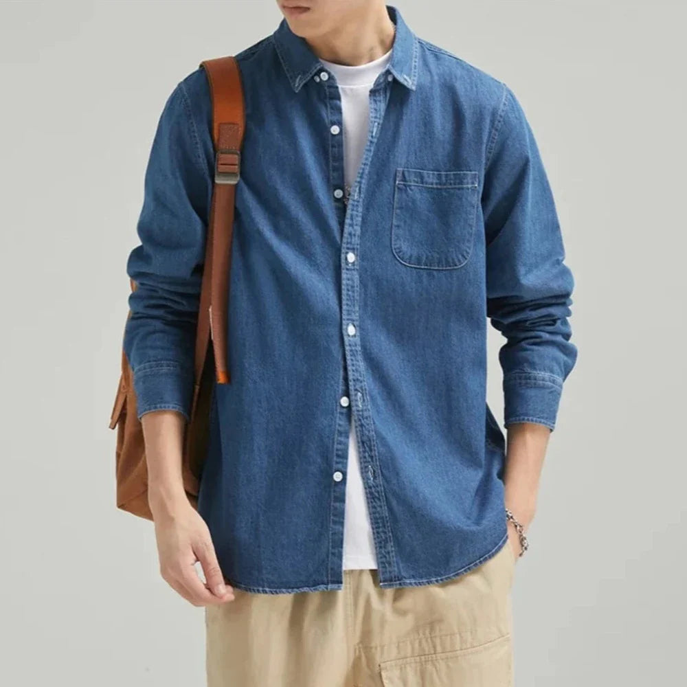 Men's Long Sleeve Denim Shirt in light blue with a chest pocket, showcasing a classic button-down design.