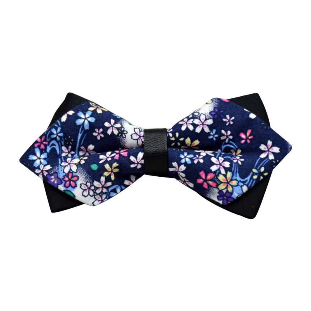 Men's navy blue pre-tied bow tie featuring a colorful floral pattern, made from 100% cotton, elegantly displayed in protective packaging.