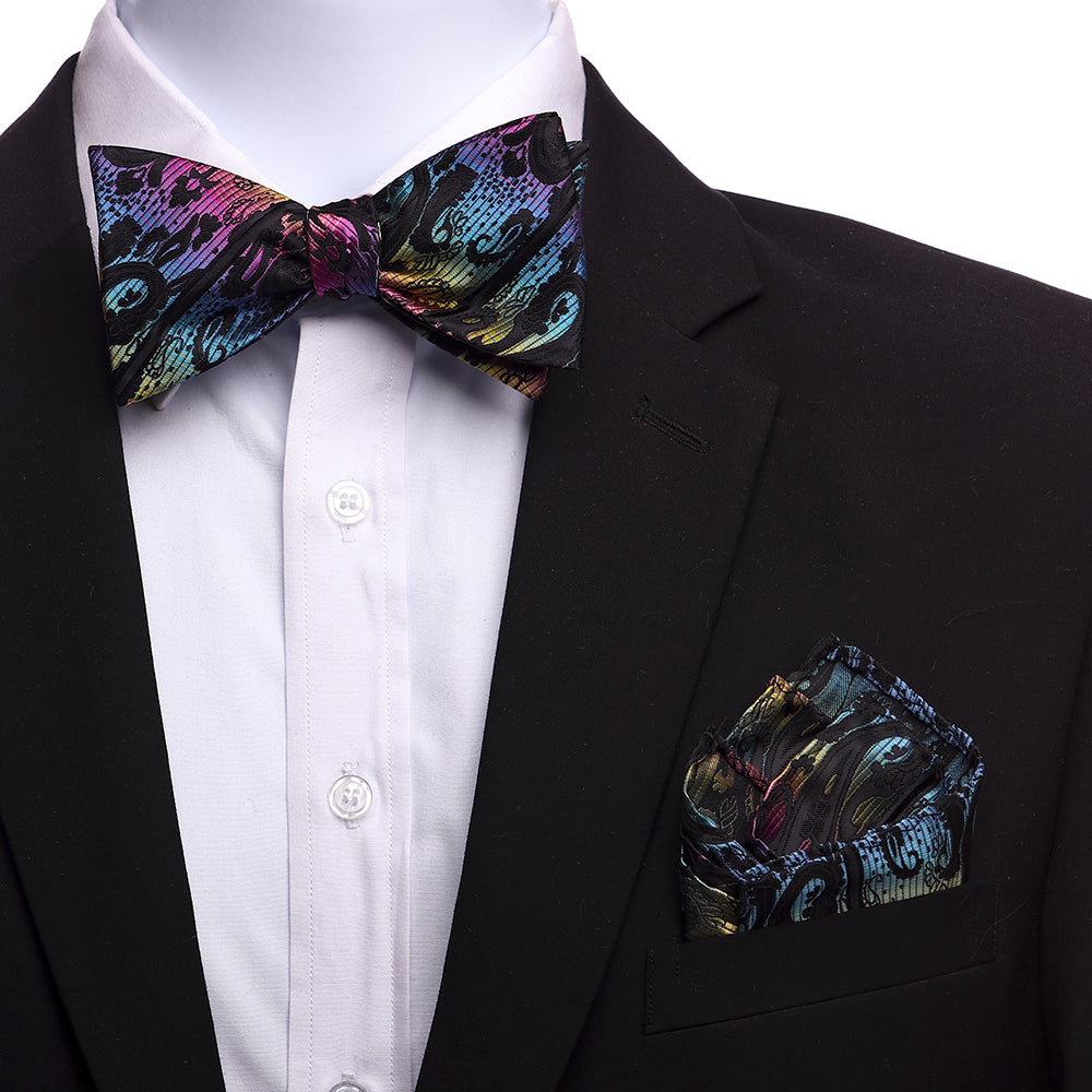 Men's Rainbow Paisley Silk Self Bow Tie with matching handkerchief in an elegant gift box, showcasing vibrant colors and intricate design.